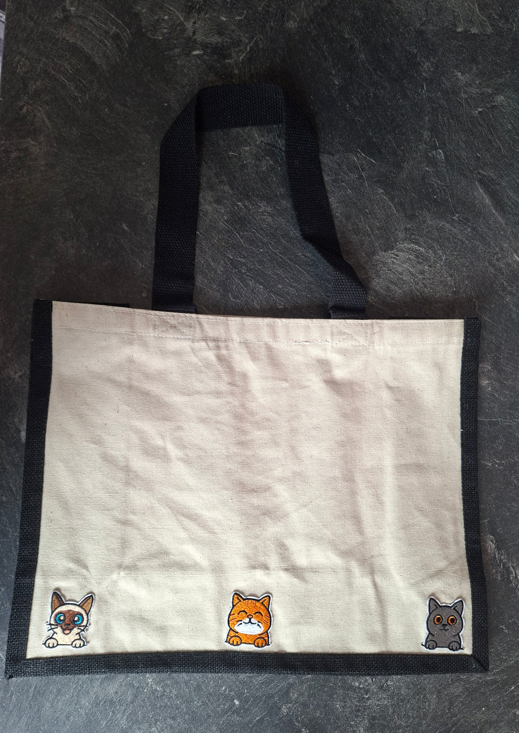 The "Purr-veillance State" jute tote