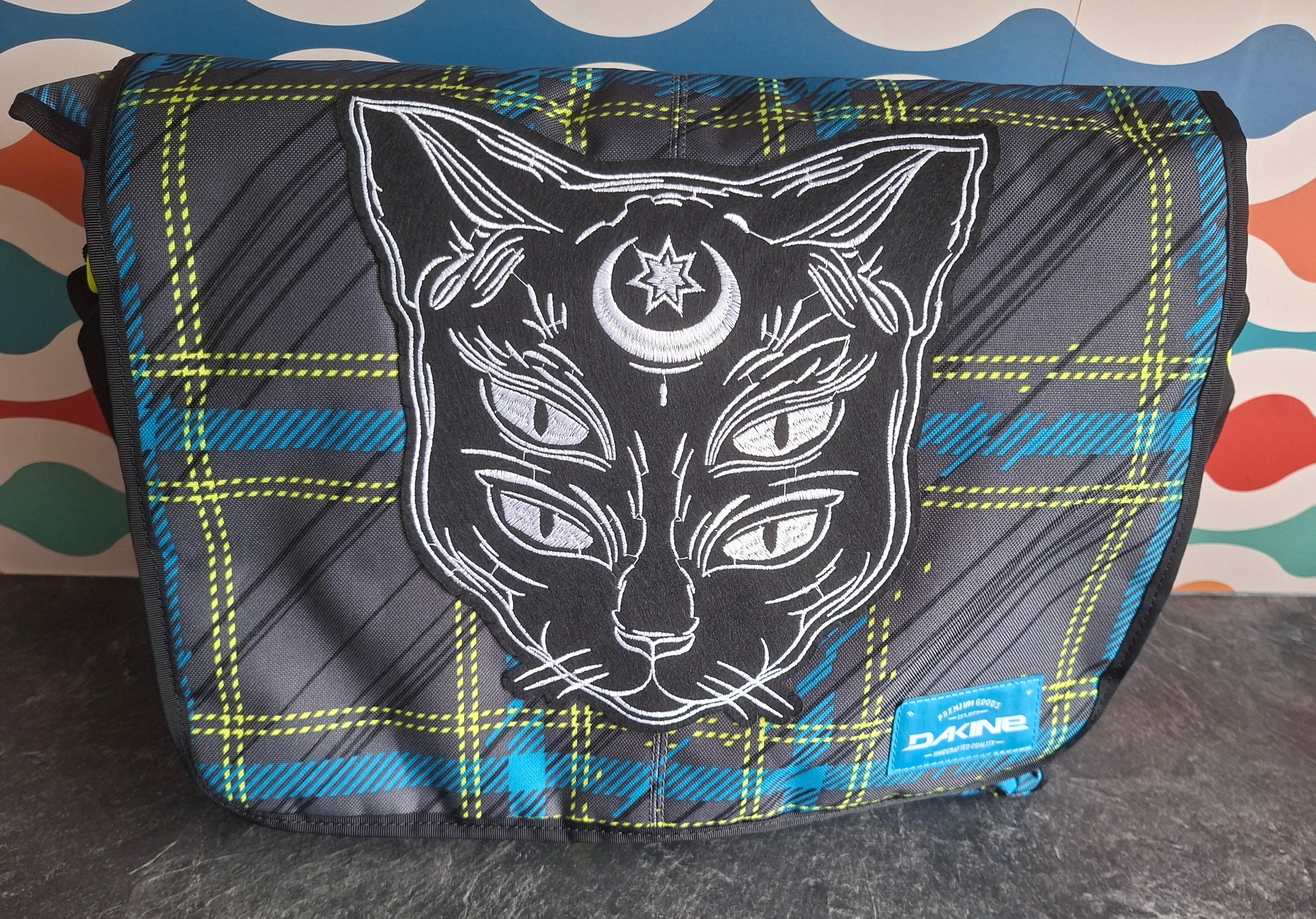 The 'Astral Kitty' messenger bag
