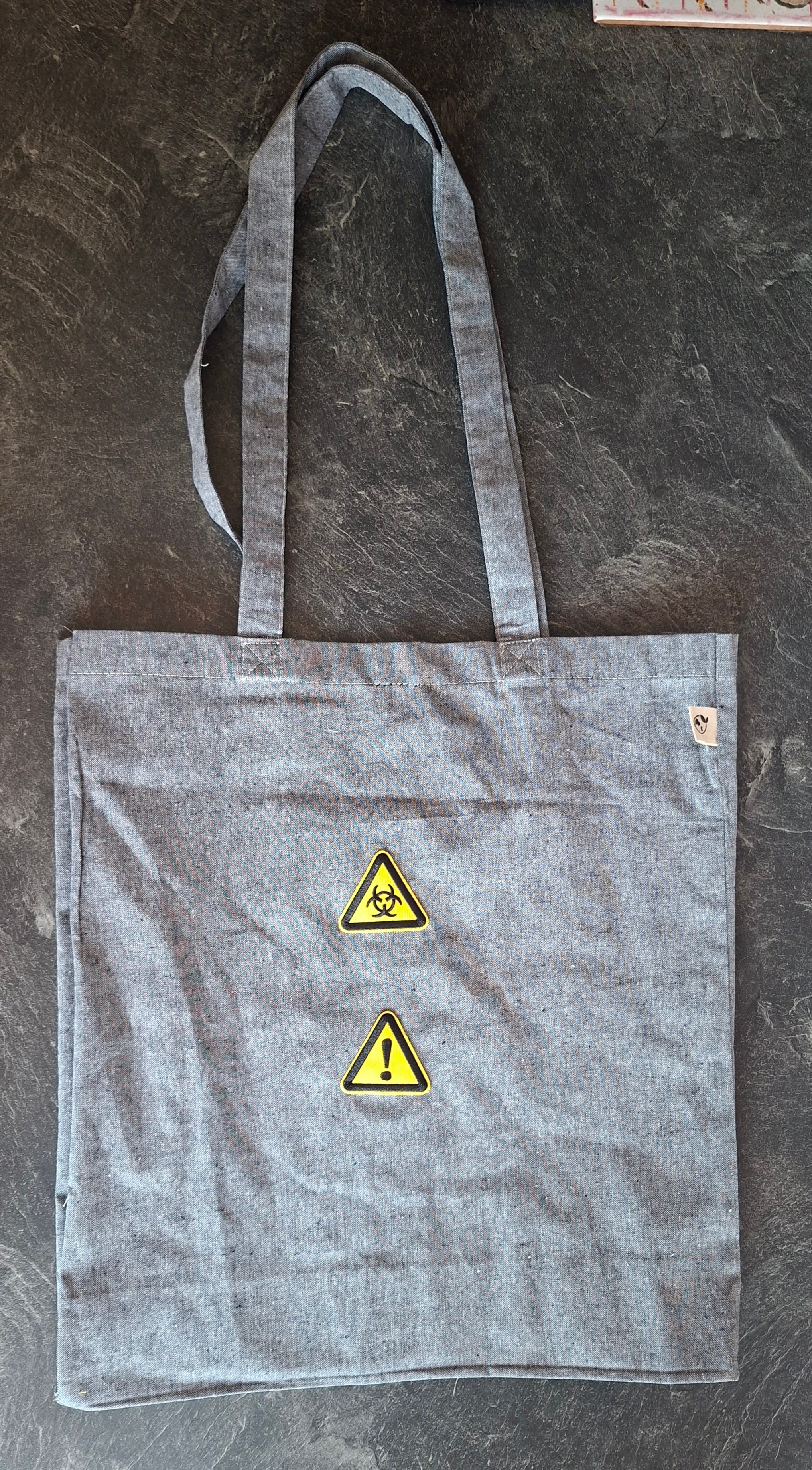 The "Walking Warning" tote bag