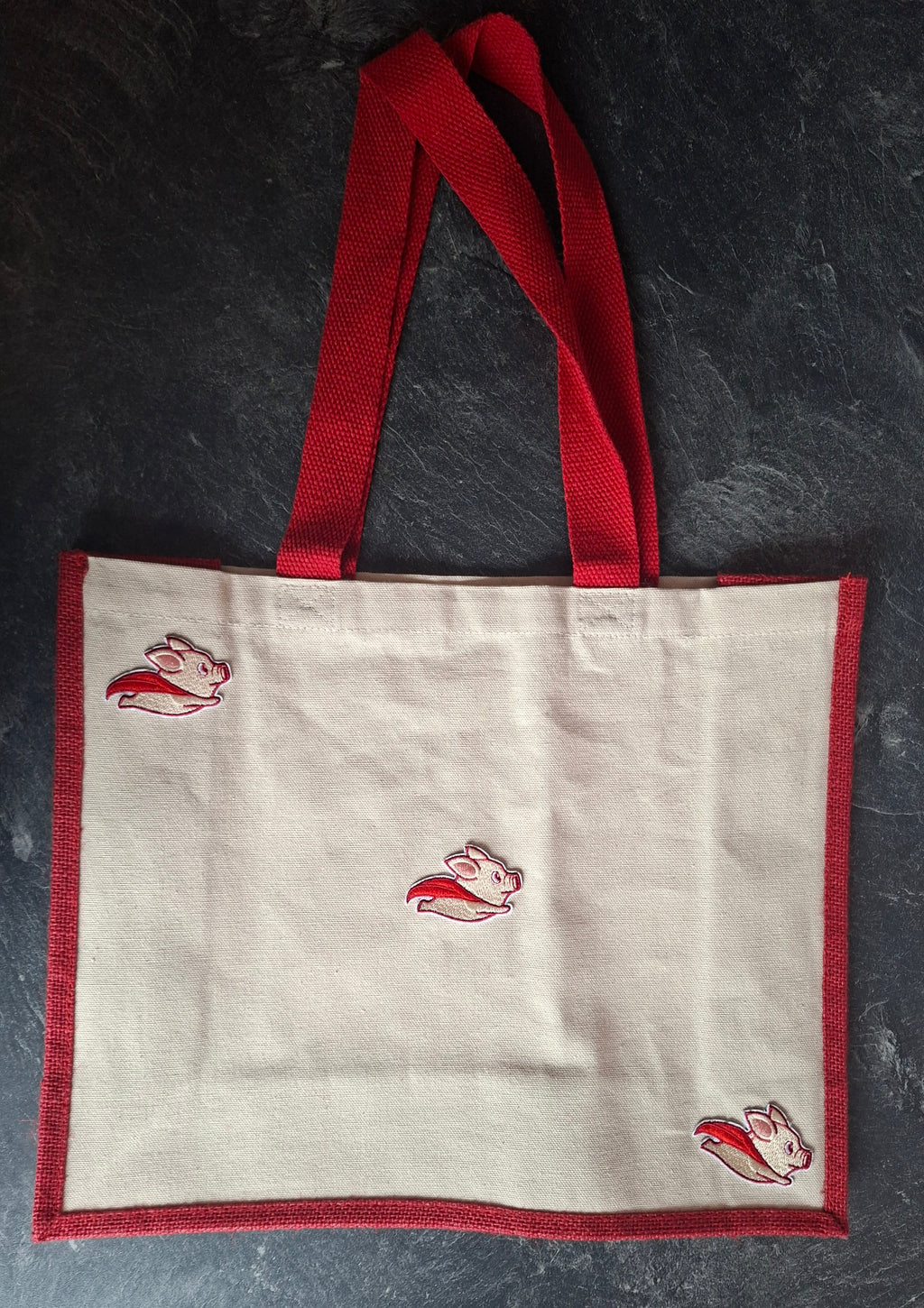 The "Never Say Never" when pigs fly jute tote