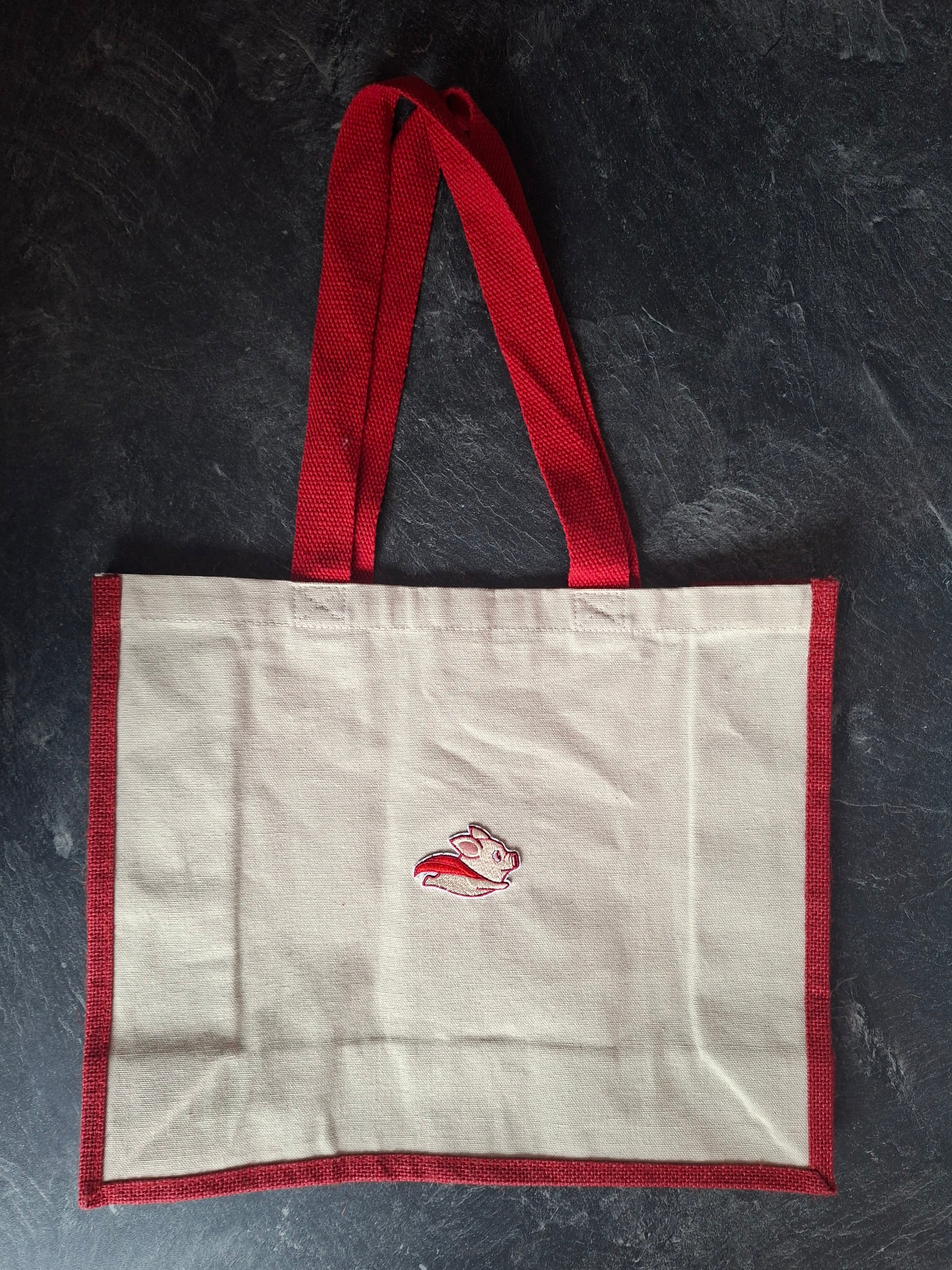 The "Never Say Never" when pigs fly jute tote