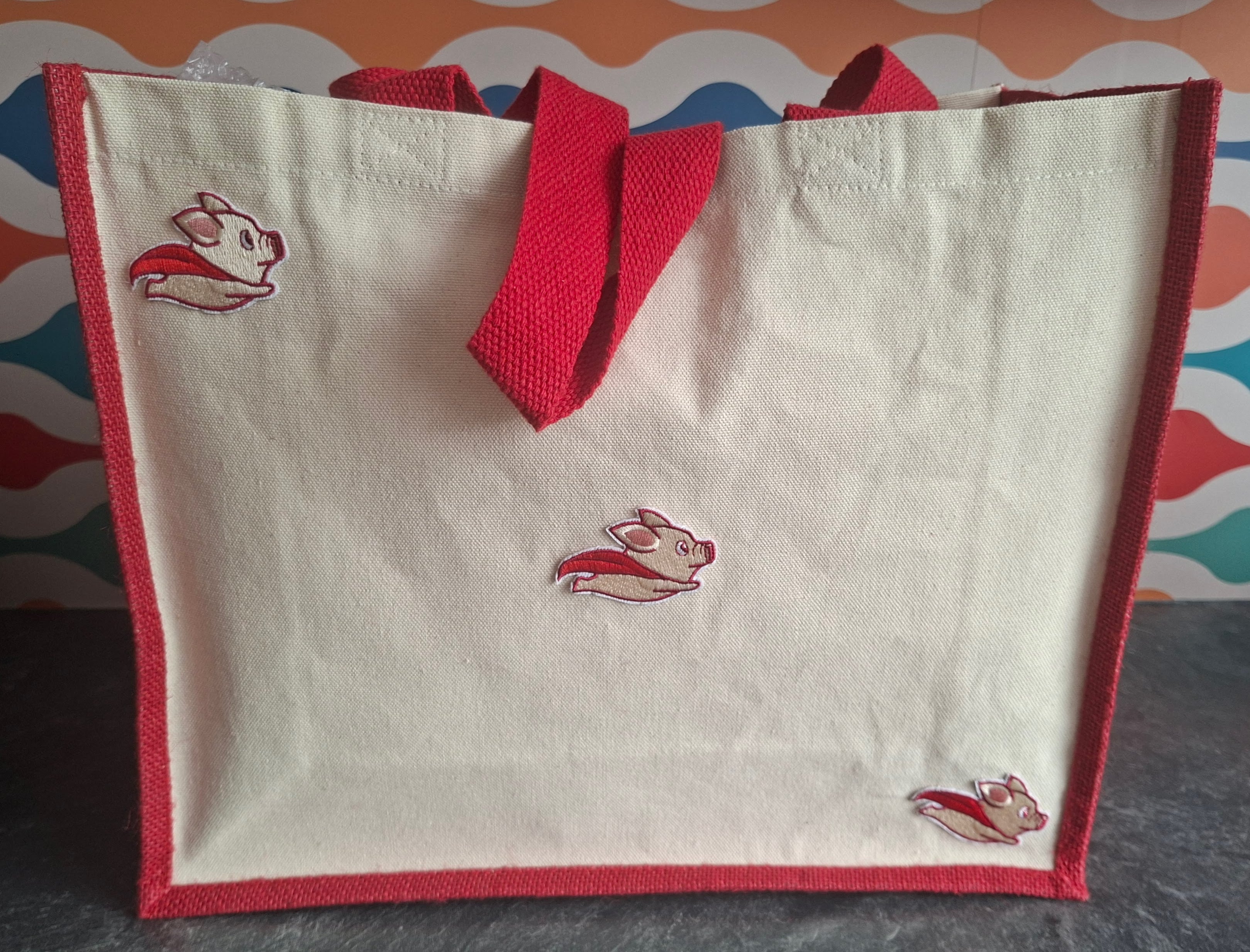 The "Never Say Never" when pigs fly jute tote