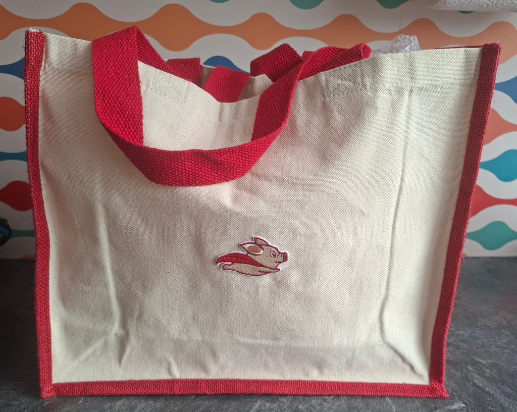 The "Never Say Never" when pigs fly jute tote