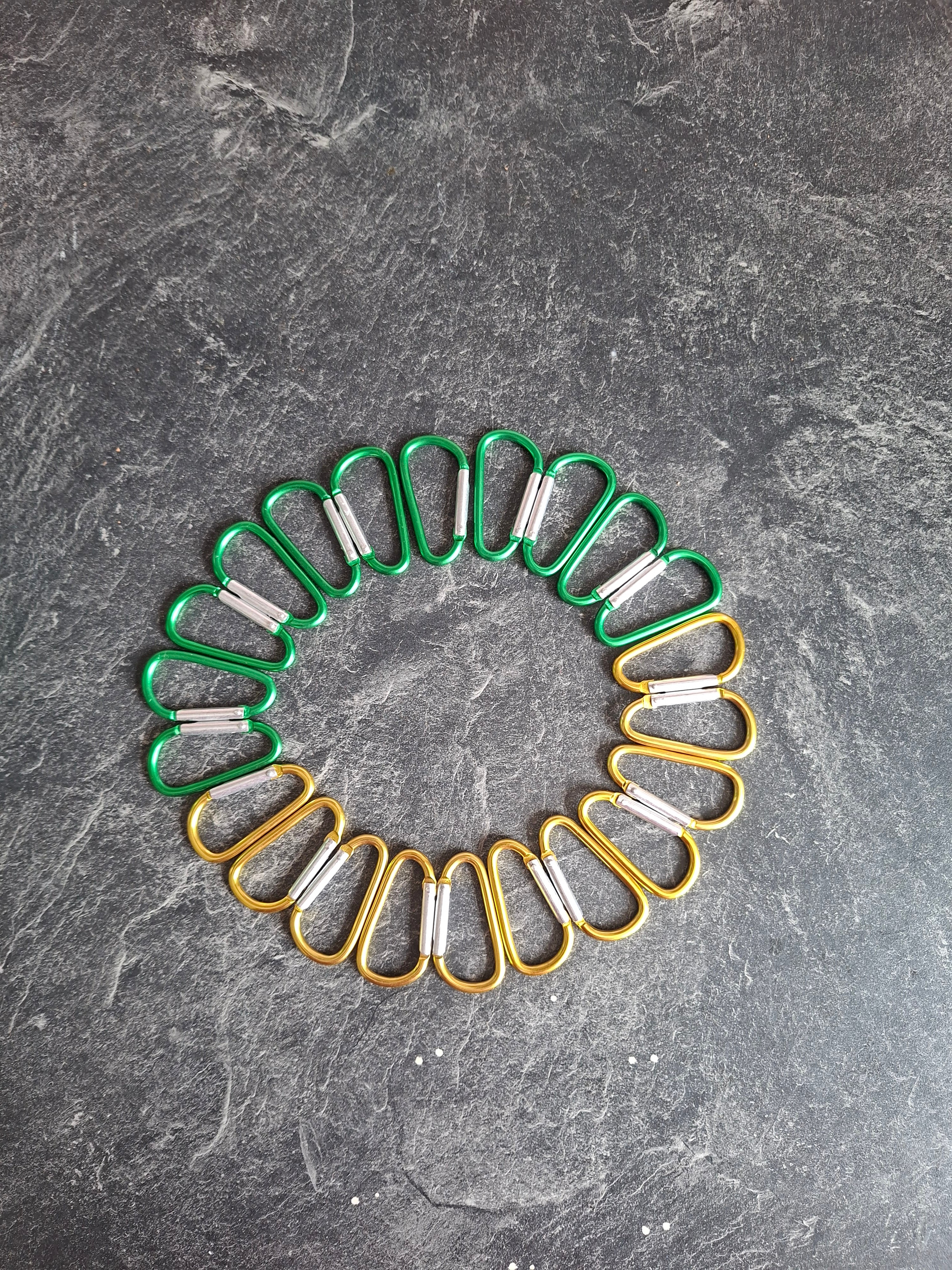The "Holding On By A Thread" bottle carabiner