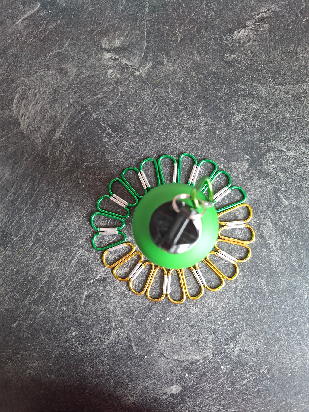 The "Holding On By A Thread" bottle carabiner