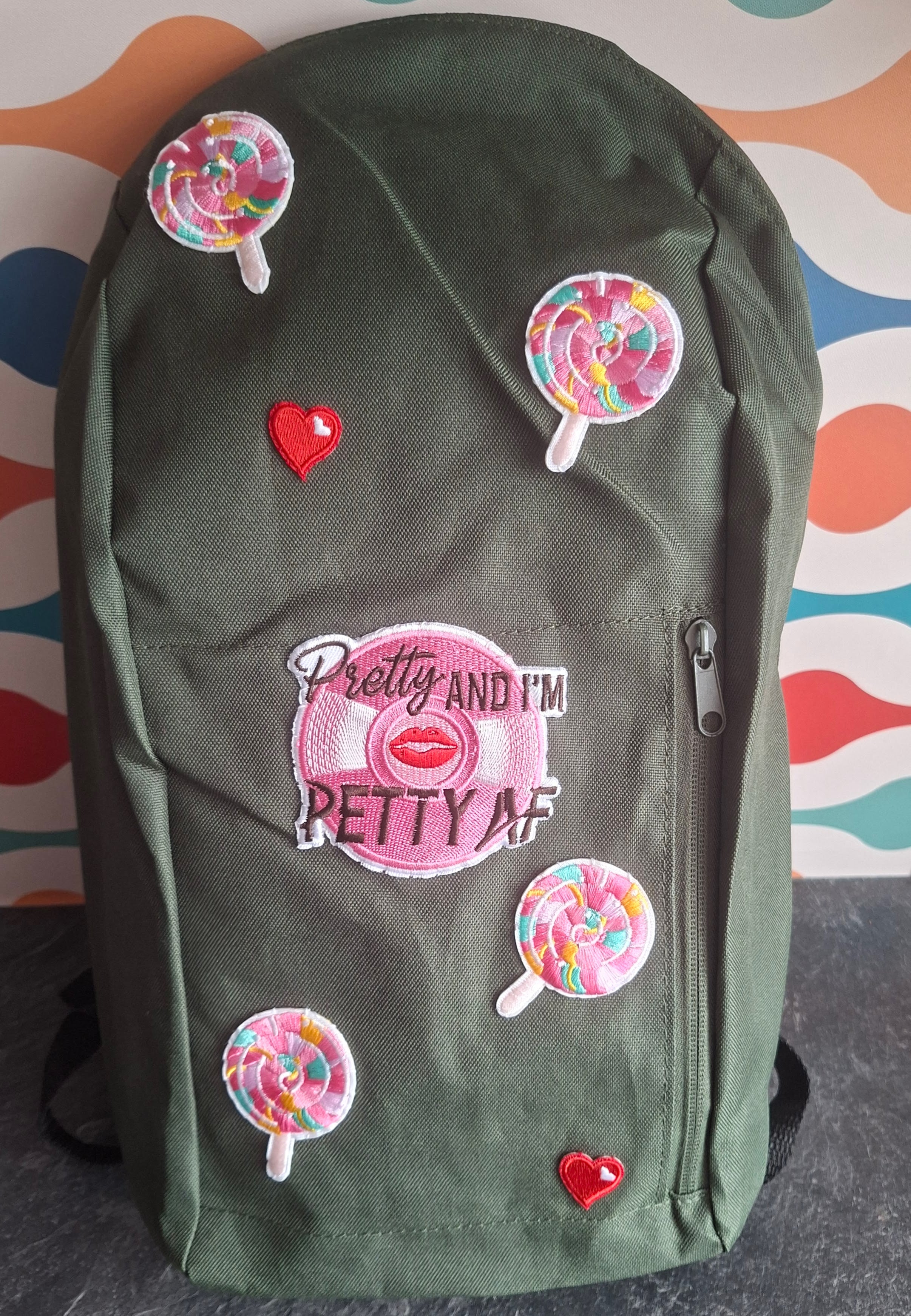 The "Looks Cute, Acts Petty" mini backpack