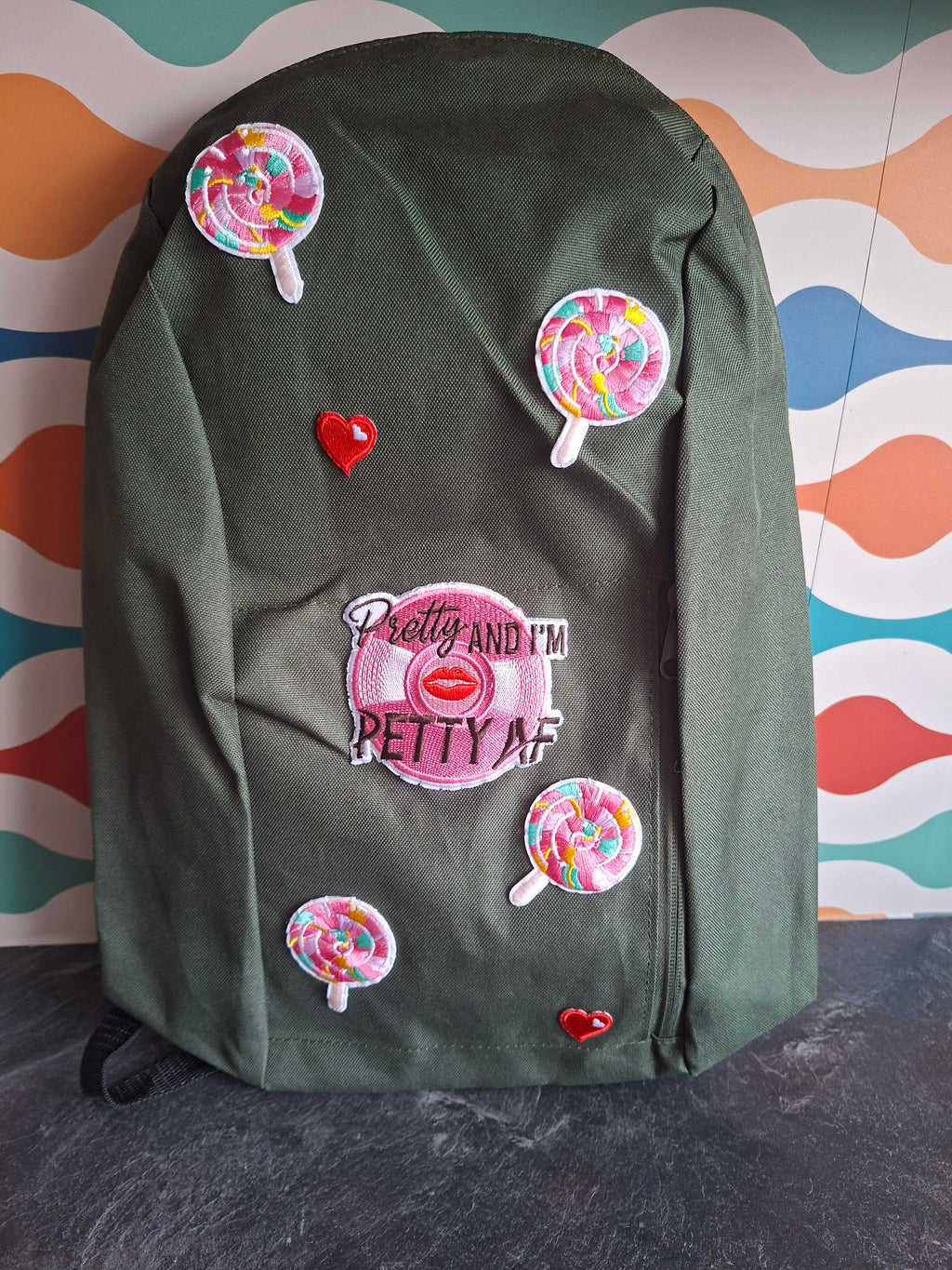 The "Looks Cute, Acts Petty" mini backpack