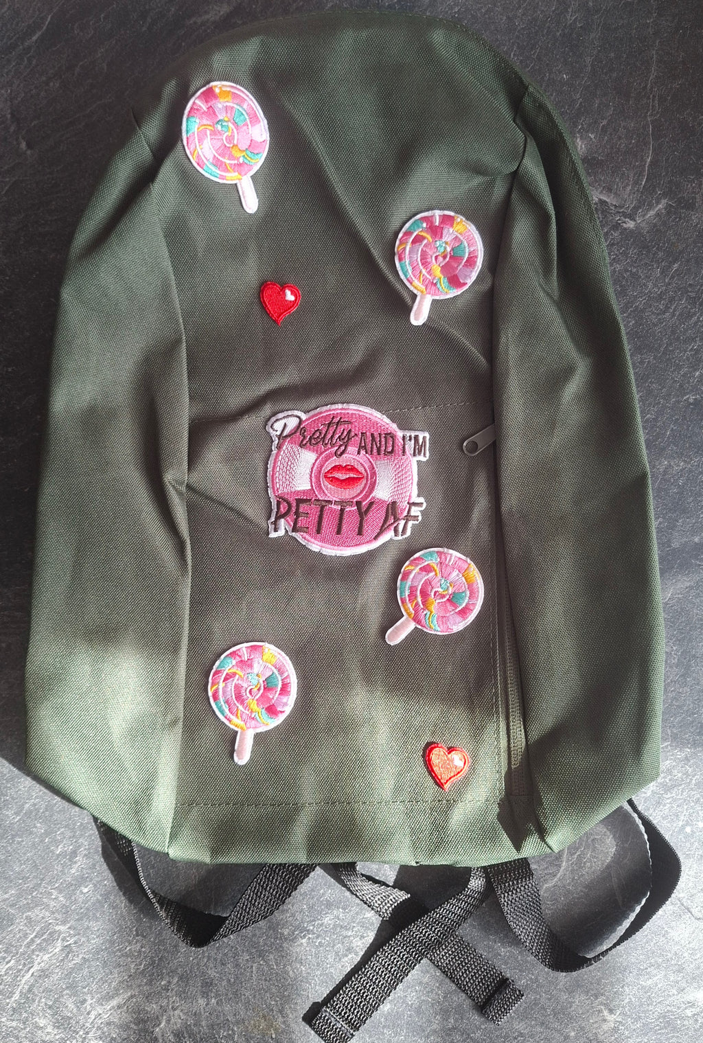 The "Looks Cute, Acts Petty" mini backpack