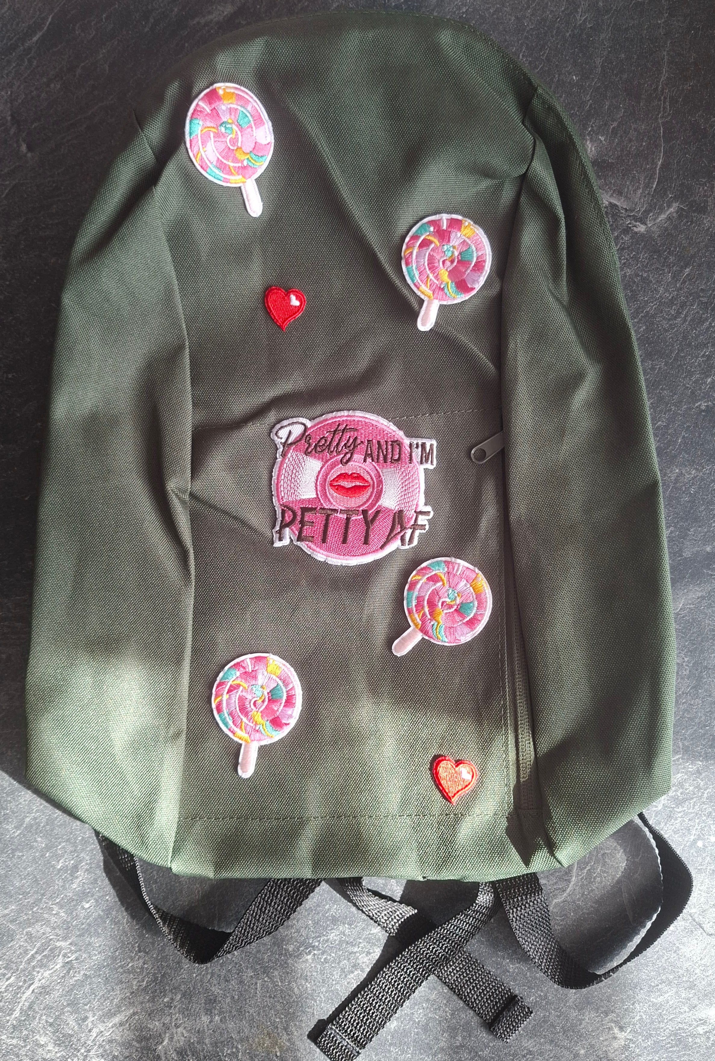 The "Looks Cute, Acts Petty" mini backpack