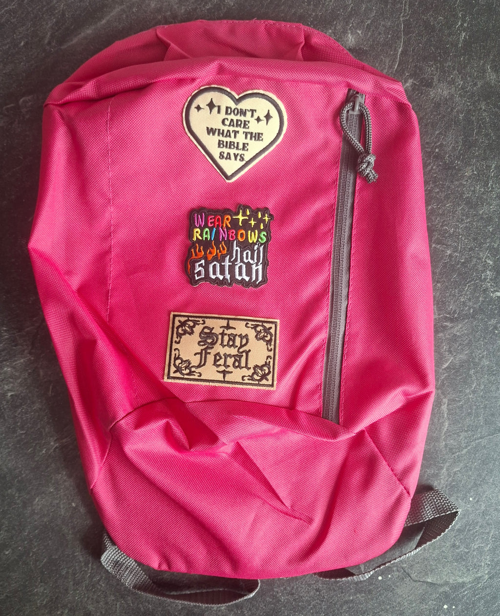 The 'Sweetly Sinful & Staying Feral' backpack