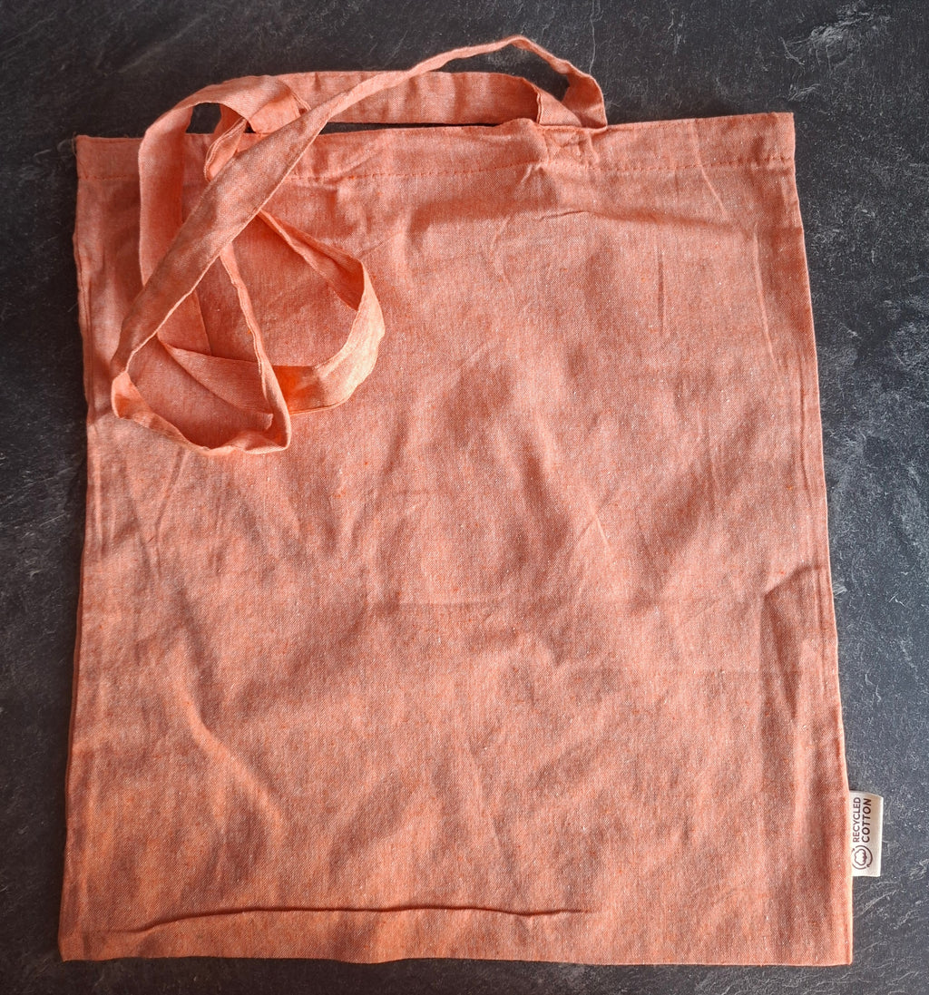 The 'Pack Light. Live Loud.' tote