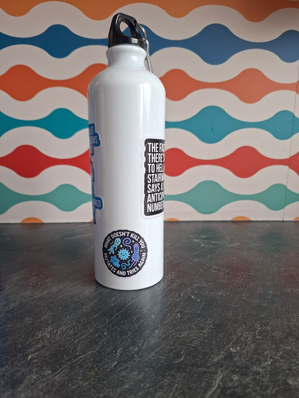 The "Aggressive Realism" water bottle 800ml - sale item
